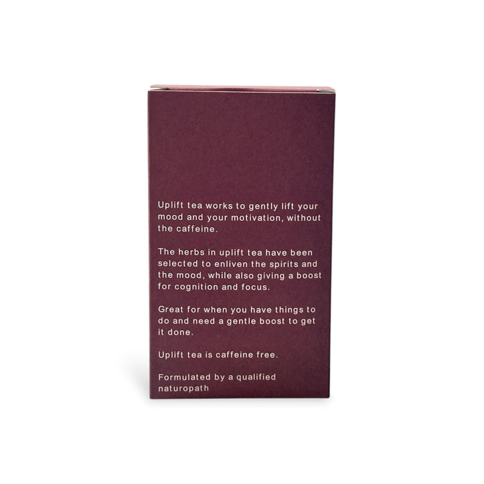 tea box with white text detailing the ingredients and benefits of Uplift Tea